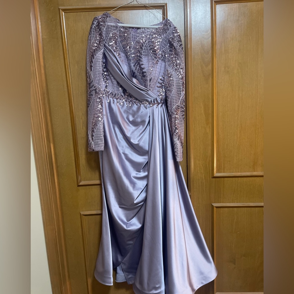 Special occasion dress. Worn once, front top beaded, side skirt. Beautiful!